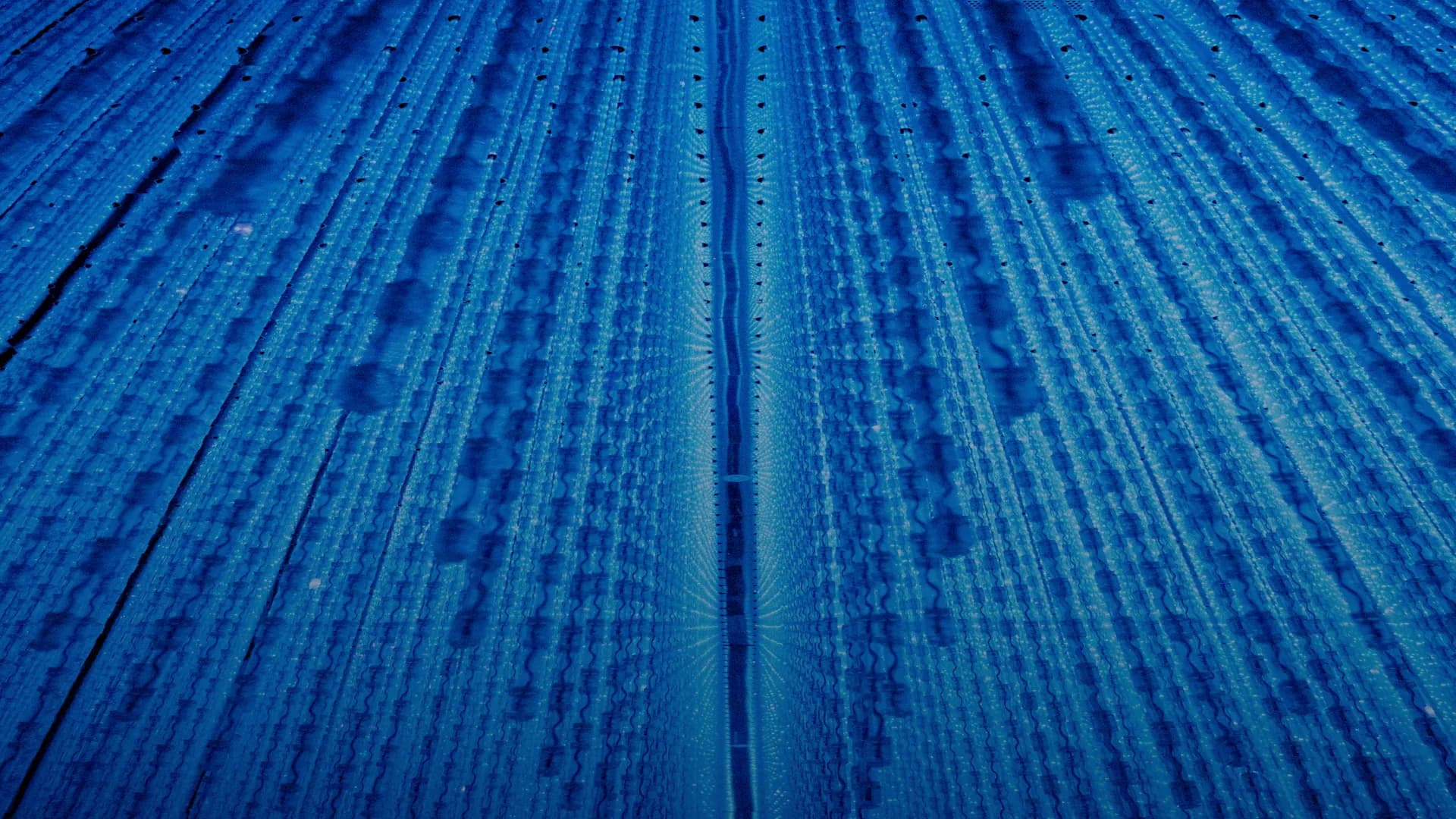 A continuous tunnel of light moving forward through darkness, representing long-running AI processing without interruption.